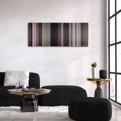 Goldfinger color palette canvas above a black sofa with a gold-topped table