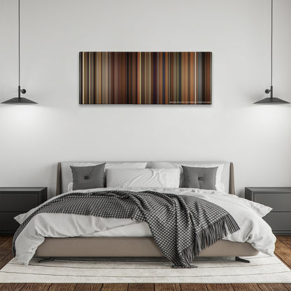 Walk the Line color palette canvas above a bed, between two black pendant lamps