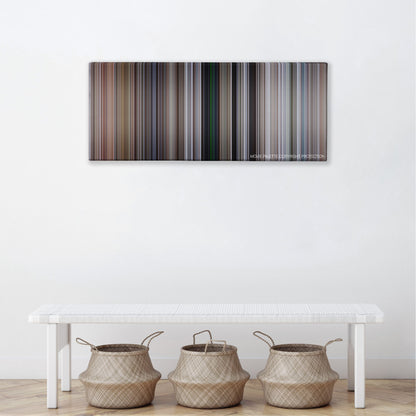 Cliffhanger color palette canvas above a white bench with three woven baskets