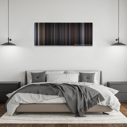 The Addams Family color palette canvas above a bed, between two black pendant lamps