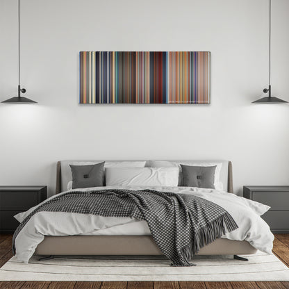 Megamind color palette canvas above a bed, between two black pendant lamps