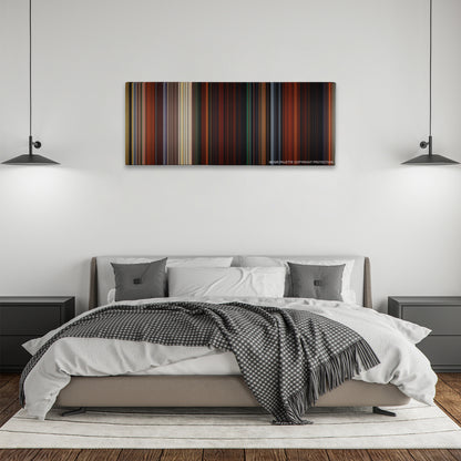 Brave color palette canvas above a bed, between two black pendant lamps