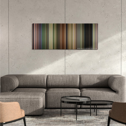 Jumanji: Welcome to the Jungle color palette canvas on a concrete wall above a gray sectional sofa