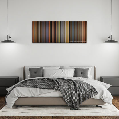 A Beautiful Mind color palette canvas above a bed, between two black pendant lamps