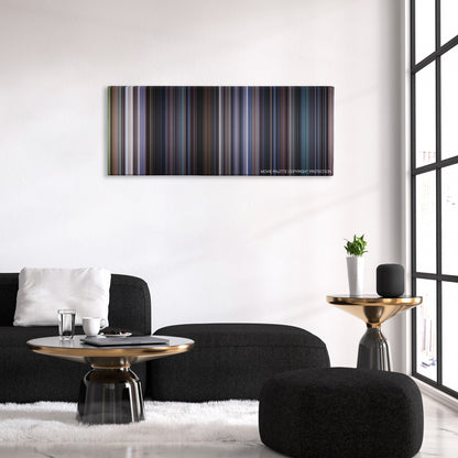 The 6th Day color palette canvas above a black sofa with a gold-topped table