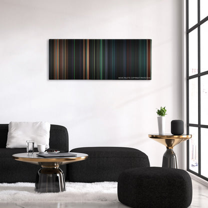 Aliens vs. Predator: Requiem color palette canvas above a black sofa with a gold-topped table