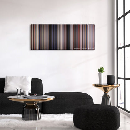 Empire of the Sun color palette canvas above a black sofa with a gold-topped table