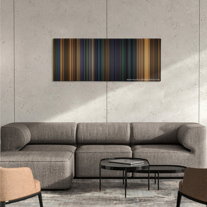 Gone in 60 Seconds color palette canvas on a concrete wall above a gray sectional sofa