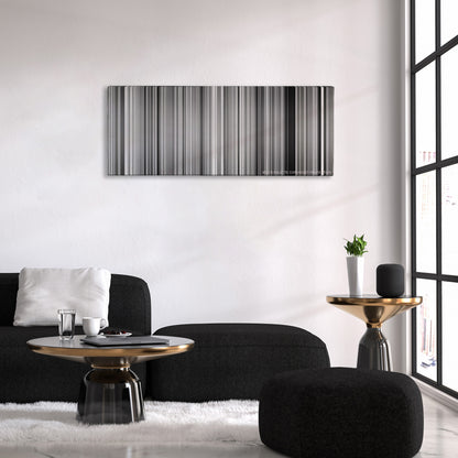 Pi color palette canvas above a black sofa with a gold-topped table