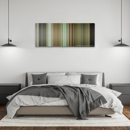 Before Midnight color palette canvas above a bed, between two black pendant lamps