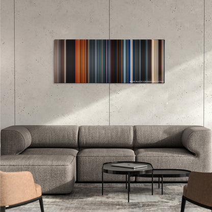 The NeverEnding Story color palette canvas on a concrete wall above a gray sectional sofa