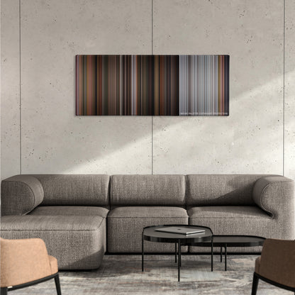 The Twilight Saga: Breaking Dawn - Part 2 color palette canvas on a concrete wall above a gray sectional sofa