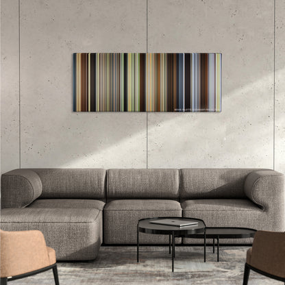 Cold Mountain color palette canvas on a concrete wall above a gray sectional sofa