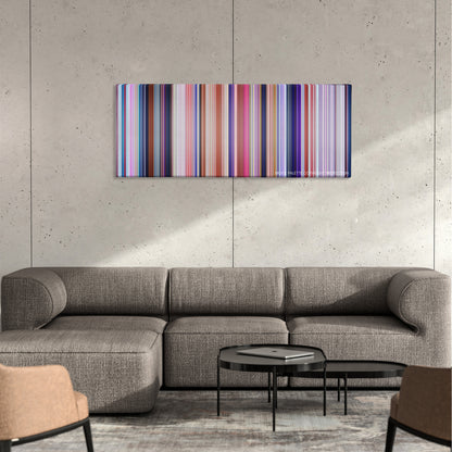 Despicable Me 3 color palette canvas on a concrete wall above a gray sectional sofa