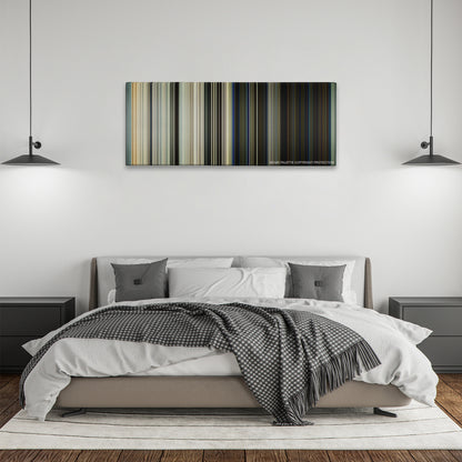 Captain Phillips color palette canvas above a bed, between two black pendant lamps