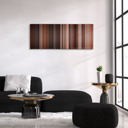 Desperado color palette canvas above a black sofa with a gold-topped table