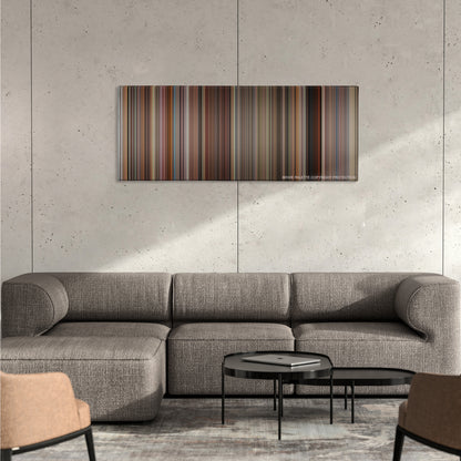 Matilda color palette canvas on a concrete wall above a gray sectional sofa