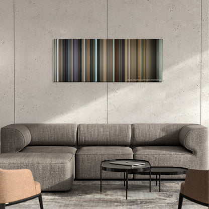 Funny People color palette canvas on a concrete wall above a gray sectional sofa