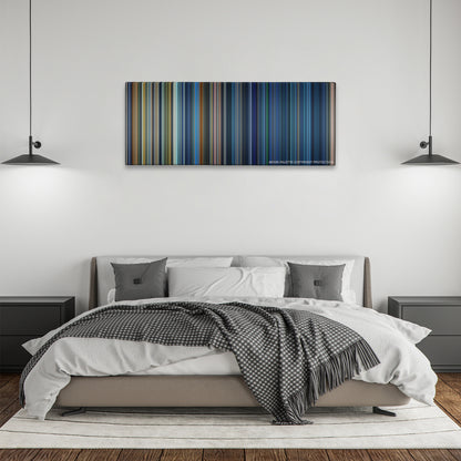 Armageddon color palette canvas above a bed, between two black pendant lamps