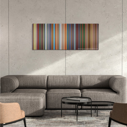 The Lego Movie color palette canvas on a concrete wall above a gray sectional sofa