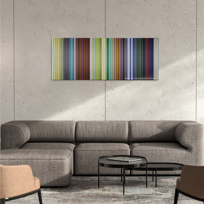 A Bug's Life color palette canvas on a concrete wall above a gray sectional sofa