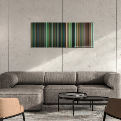Joker color palette canvas on a concrete wall above a gray sectional sofa