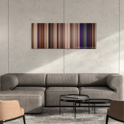 Neighbors 2: Sorority Rising color palette canvas on a concrete wall above a gray sectional sofa