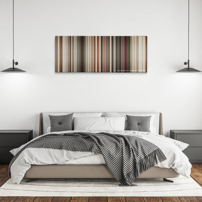Sex and the City color palette canvas above a bed, between two black pendant lamps