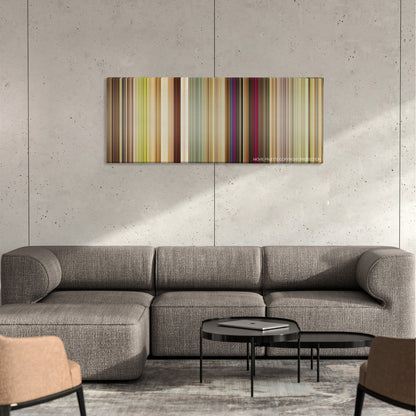 Dirty Grandpa color palette canvas on a concrete wall above a gray sectional sofa