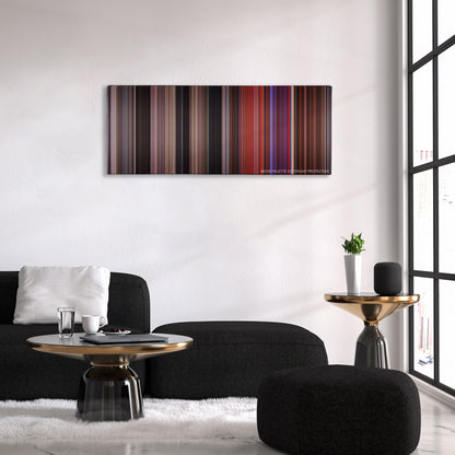 Carrie color palette canvas above a black sofa with a gold-topped table
