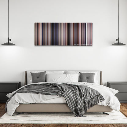 Empire of the Sun color palette canvas above a bed, between two black pendant lamps