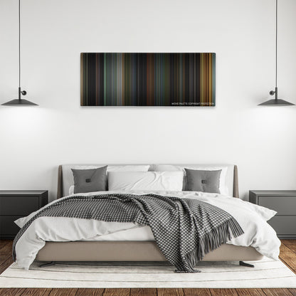 House of Wax color palette canvas above a bed, between two black pendant lamps