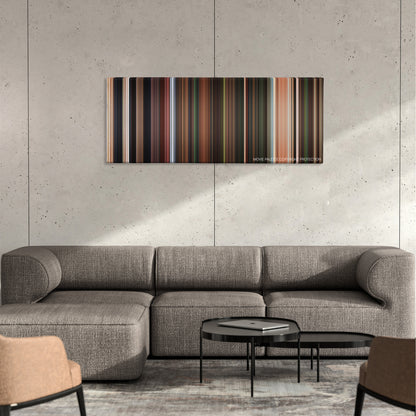 Flushed Away color palette canvas on a concrete wall above a gray sectional sofa