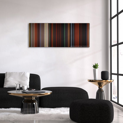 Brave color palette canvas above a black sofa with a gold-topped table