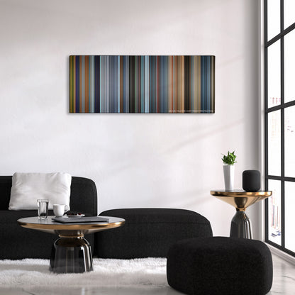 Fast & Furious Presents: Hobbs & Shaw color palette canvas above a black sofa with a gold-topped table