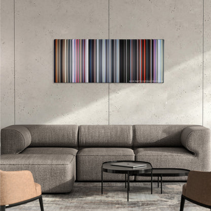 2001: A Space Odyssey color palette canvas on a concrete wall above a gray sectional sofa