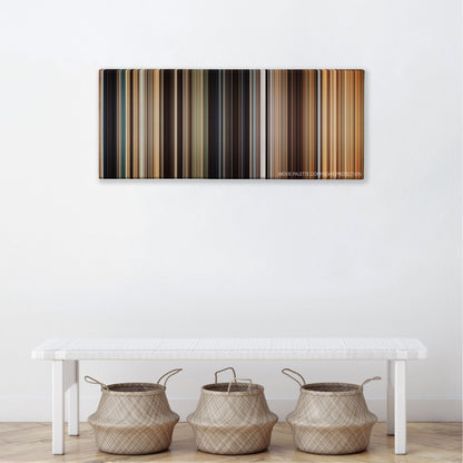 I Origins color palette canvas above a white bench with three woven baskets