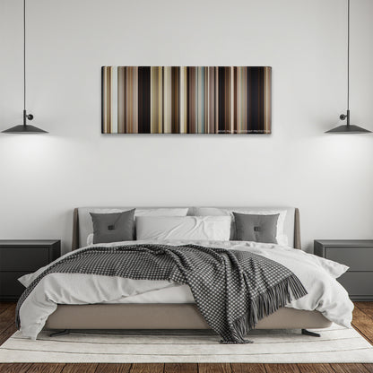Mud color palette canvas above a bed, between two black pendant lamps