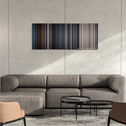 The Avengers color palette canvas on a concrete wall above a gray sectional sofa