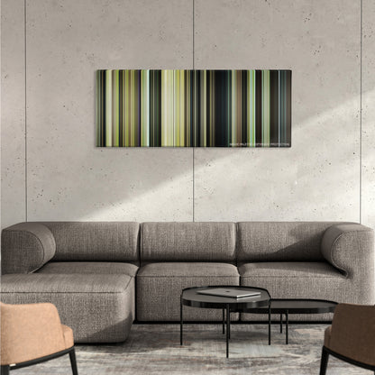 Call Me by Your Name color palette canvas on a concrete wall above a gray sectional sofa