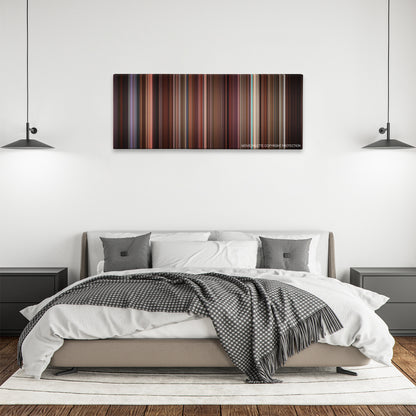 Leaving Las Vegas color palette canvas above a bed, between two black pendant lamps