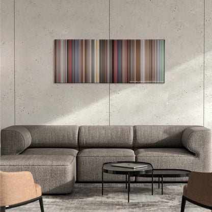 Good Will Hunting color palette canvas on a concrete wall above a gray sectional sofa