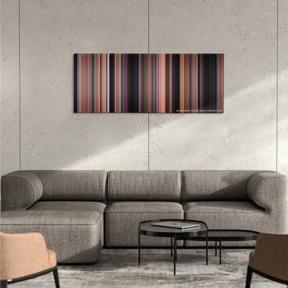 Spider-Man color palette canvas on a concrete wall above a gray sectional sofa
