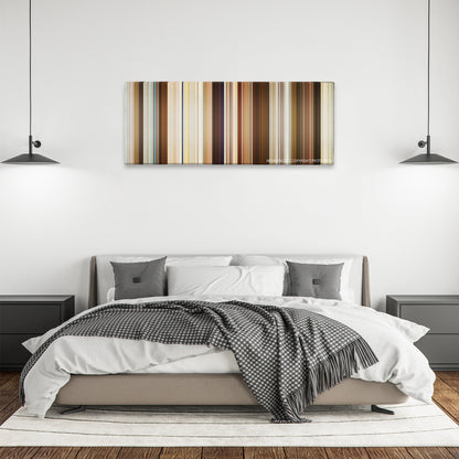 Bad Moms color palette canvas above a bed, between two black pendant lamps