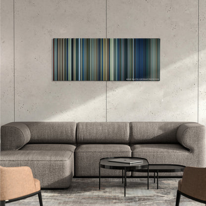 The Lord of the Rings: The Two Towers color palette canvas on a concrete wall above a gray sectional sofa