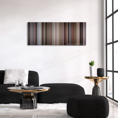 The Meaning of Life color palette canvas above a black sofa with a gold-topped table