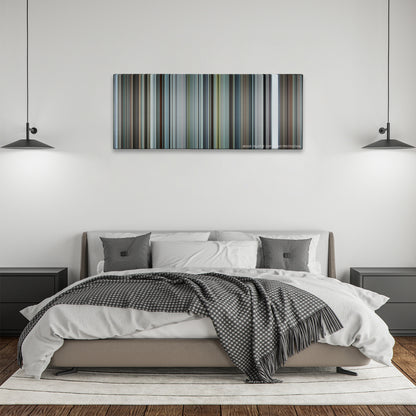 Burnt color palette canvas above a bed, between two black pendant lamps
