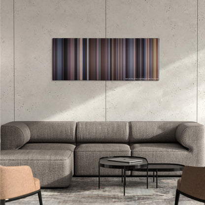 The Shawshank Redemption color palette canvas on a concrete wall above a gray sectional sofa