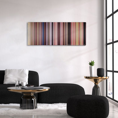 She's the Man color palette canvas above a black sofa with a gold-topped table