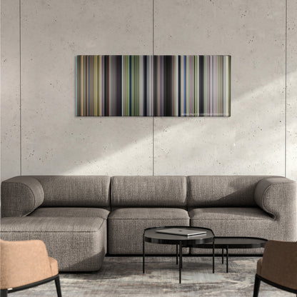 Forrest Gump color palette canvas on a concrete wall above a gray sectional sofa